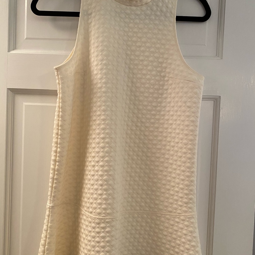 NEVER WORN sleeveless dress with slight ruffle hem